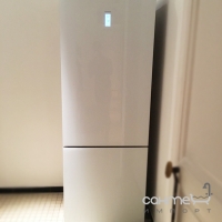 Отдельностоящий двухкамерный холодильник с нижней морозильной камерой Siemens KG49NSW31 белый